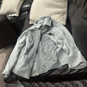 Jacqueline Smith sport large gray zip up jacket